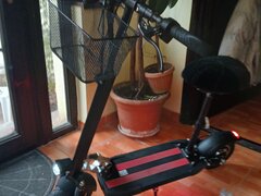 Scuter electric cu scaun f putin folosit